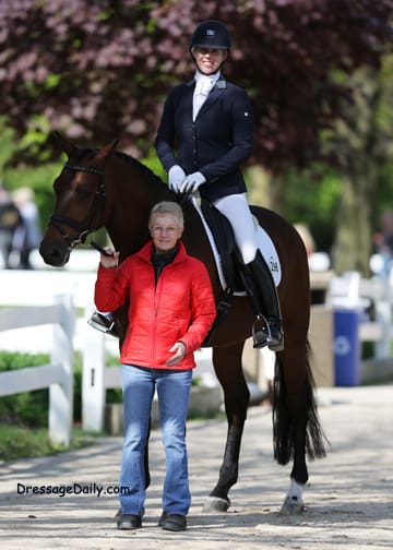 Cover -  Patricia (Patti) Becker and Owner Joan Pecora of Edward (United x Damiro) prepare for the 5 year old Markel Young Horse Finals at the Lamplight Equestrian Center, August 20-24, 2014 (Photo: DressageDaily.com)