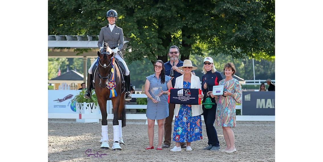 Photo: Markel's Kaitlyn Naughton, Brandon Seger and Mary Phelps join Charlotte Bredahl and judge Jodi Jones Lees to present the award to Olivia LaGoy-Weltz and Johnny Be Goode.  (Credit: ©SusanJStickle.com)