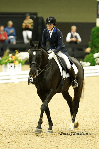 Cover - California's Akiko Yamazaki celebrated her success aboard "Matrix" in the Prix St. Georges Adult Amateur Championship on the final day of the US Dressage Finals presented by Adequan®, 2013. (Photo: SusanJStickle.com)