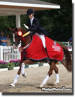 Photo:  Dressage rider Caroline Roffman in the victory lap with Bon Chance, took the 2011 Markel/USEF National Young Horse Dressage Championships at the Lamplight Equestrian Center by storm. Roffman, of Wellington, Florida, rode away with three Reserve Championships aboard San City, Bon Chance and Pie