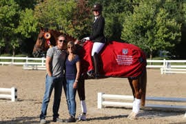 Cover - Brooke Voldbaek and Sonnenberg Farm's mare Generosa S, 4-year-old Reserve Champion at the Markel/USEF National Young Horse Championships (Photo: Mary Phelps)
