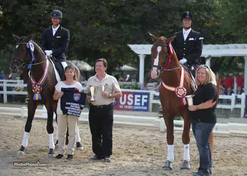 Photo:  Left to Right. Michael Bragdell on Hemmingway, Owners Theresa Schnnell and Bob Jackson, Chris Hickey on Oredit Hiltop, and Natalie DiBerardinis is General Manager of Hilltop. The two stallions win Champion and reserve at the 2012 Markel/USEF National Young Horse Championship for 4-year-olds
