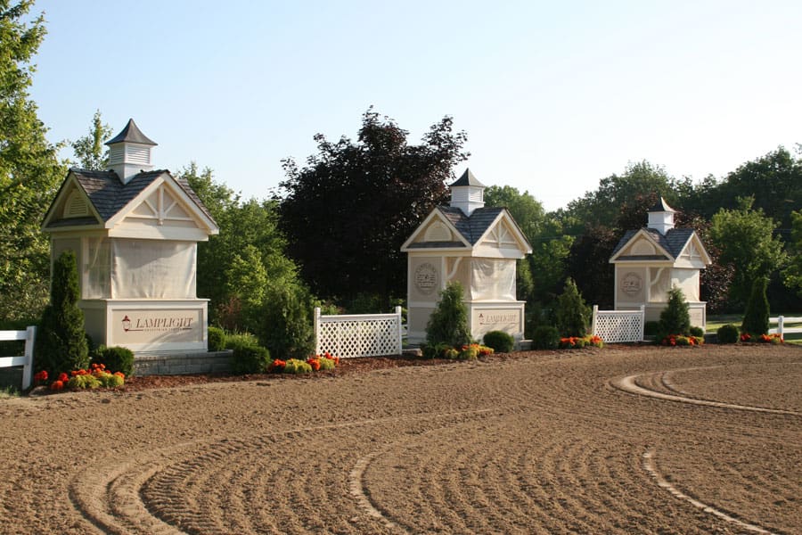 Cover - One of the immaculate show arenas at the Lamplight Equestrian Center, 2013.