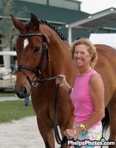 Cover - Susan Jaccoma and Wadamur (13-year-old bay Hanoverian gelding by (Weltmeyer-Sandro Hit) affectionately known as "Moe” 2013. (Photo: PhelpsPhotos.com)