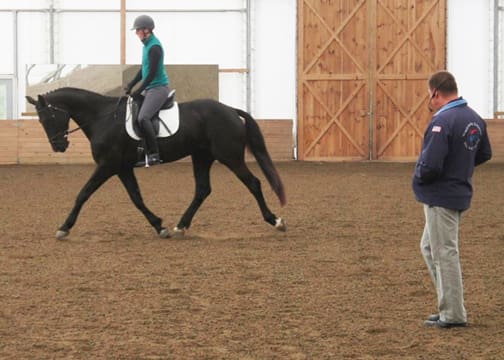 Photo:  Scott Hassler works with Allison Kavey from Millbrook, New York and Andrea Woodner's 2007 Hanoverian Mare Daquiri by Delaurentis by Falkland, American bred by Angela Barilar and High Point Hanoverians