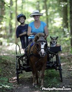 Cover - Mary Phelps, Logan, Buddy, and Tasha, 2009.  (PhelpsPhotos.com)