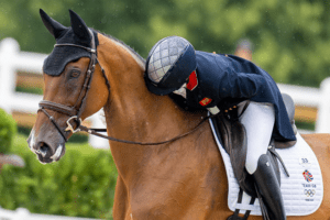 Laura Collett (GBR) and LONDON 52 during Eventing Dressage at the Chateau de Versailles for the Paris 2024 Olympic Games. © FEI/Benjamin Clark
