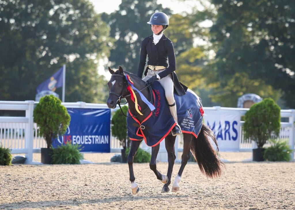 Lilly Herzog and Boca's Entourage. (Photo: ©Leslie Potter/US Equestrian)