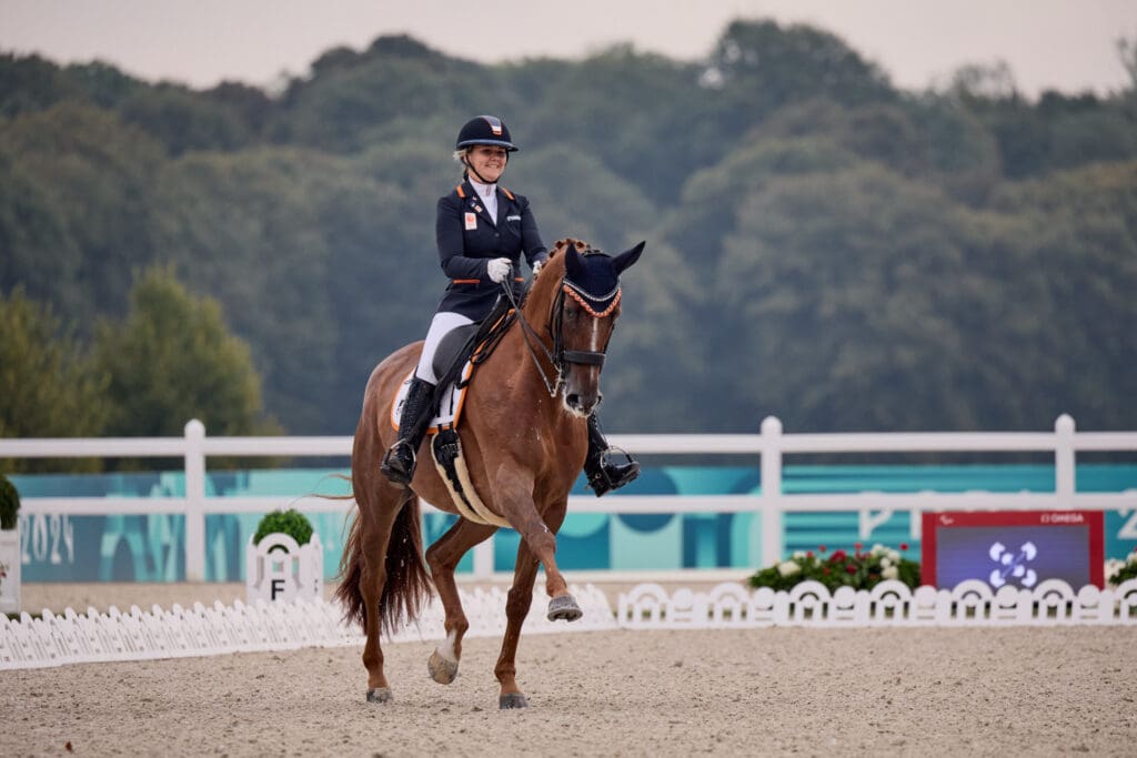 Demi Haerkens (NED) grade 4 with Daula. (Photo Copyright © FEI/Liz Gregg)