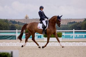Fiona Howard (USA) grade 2 with Diamond Dunes. Paris 2024 Paralympics. (Photo Copyright © FEI/Liz Gregg)