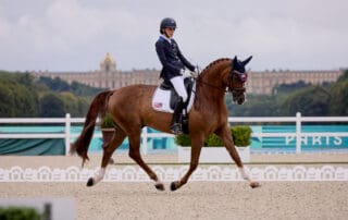 Fiona Howard (USA) grade 2 with Diamond Dunes. Paris 2024 Paralympics. (Photo Copyright © FEI/Liz Gregg)