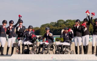 Team competition podium at the Paris 2024 Paralympic Games. L-R: Team Nederlands (silver medal) Team USA (gold medal) and Team Germany (bronze medal). © FEI/Liz Gregg