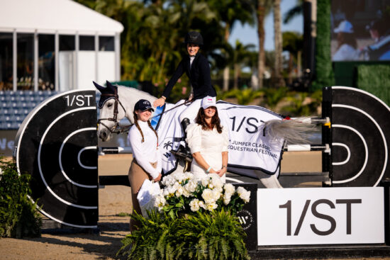 Jessica Springsteen & Naomi van het Keizershof are presented as winners of the $32,000 1/ST CSI2* Qualifier by Orlie Tonellato and Tiffani Steer, VP Communications, 1/ST & The Stronach Group. Photo © Ashley Neuhof