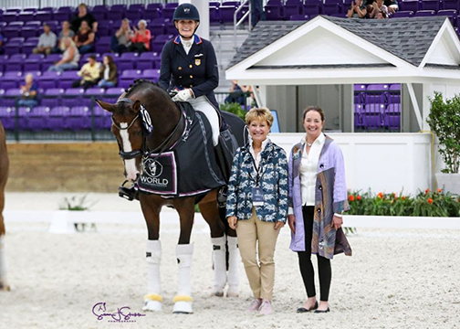 Ashley Holzer and Havanna 145 won the Grand Prix Freestyle CDI-W and were presented in the awards ceremony by judge at C Janet Foy and show manager Debra Reinhardt at World Equestrian Center Dressage IV. Photo by SusanJStickle.com.