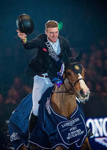 Great Britain’s William Whitaker posted the biggest win of his career when galloping to victory with Utamaro d’Ecaussines in today’s Longines FEI Jumping World Cup™ 2018/2019 Western European League qualifier at Olympia in London (GBR). (FEI/Jon Stroud)