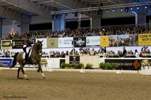Germany's Anja Plönzke competes against the backdrop of a sold-out house at the World Dressage Masters. (Photo: Susan J. Stickle)