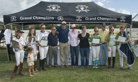 All smiles from left to right, Mia Astrada and her little sister; Riley Ganzi, Chase Schwartz, USPA CEO Peter Rizzo, Grand Champions coach John Gobin, I/I Director Amy Wisehart, I/I Program Assistant Ali Davidge, Rachel Kelly, The Polo School coach Charlie Muldoon, Alyssa Tranchilla, Jacqui Casey. Photo by Scott Fisher