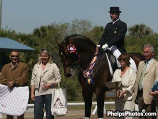 Charlotte Bernal with Marco and Farewell IV winning the Marty Simensen Memorial Trophy at the 2010 Palm Beach Dressage Derby. Pictured to the right is Holly Simensen and international "O" judge Stephen Clarke