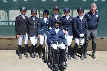 USA Riders at the Golden State Dressage Classic CPEDI3* (Left to Right) Elizabeth Traband, Holly Bergay, Deborah Stanitski, Kate Shoemaker, Susan Treabess, Ashleigh Flores-Simmons, Chef d'Equipe Kai Handt, and up front is U.S. Air Force Veteran Derrick Perkins. Photo by John Stevenson.