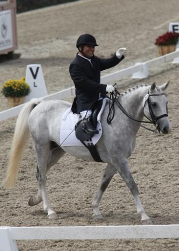 Frederick Win riding Kaboom owned by USEF 'S' judge, Sara Schmitt, at the 2011 NEDA/USEF Para Equestrian National Championships held in Saugerties, NY. 