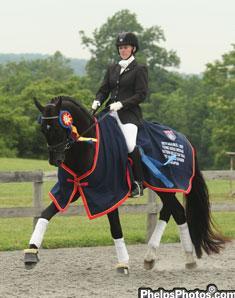 Lauren Chumley and the Hanoverian stallion Somer Hit, 2011. (PhelpsPhoto.com)