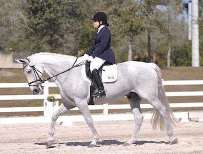 Jody Schloss and Inspector Rebus 2012 won the Overall Best Presentation at the Houston Dressage Society CPEDI3* FEI JOG