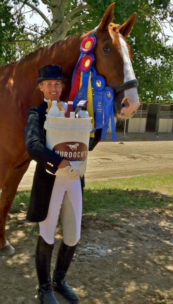 Suzie Halle and Tennyson ISF, by Contango, earned two FEI Amateur/Junior High Points and one Reserve High Point during June High Prairie Dressage at the Colorado Horse Park. Among their awards were beautiful gift buckets full of prizes from Murdoch's Ranch and Home Supply.