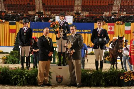 Randolph College/ USEF National Junior Jumper Individual Champion Lillie Keenan (center) takes the gold, while Gabriella Mershad (left) wins silver and Michael Hughes (right) wins bronze