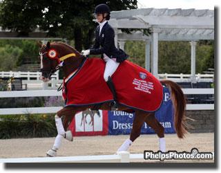 Caroline Roffman and Bon Chance earn Roffman a third cooler and tropy for the week, 2011. (PhelpsPhotos.com)