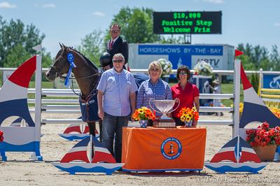 David Beisel and Ammeretto celebrate victory with, from left, Dale Nielson, Alex Rheinheimer and Patrice Schreiber