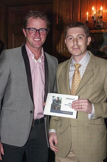 Will Faudree (left) receives a certificate for Dubarry boots from Danny Hulse of Dubarry. (Michelle Dunn photo)
