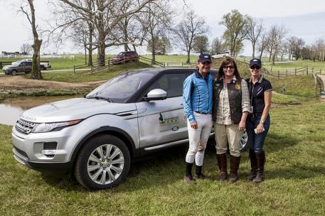 Phillip Dutton (left) and wife Evie (right) accepted a 2014 Range Rover Evoque from Kim McCullough, the Land Rover of North America vice president for branding, at the Rolex Kentucky Three-Day Event, presented by Land Rover. (Ben Radvani photo) 