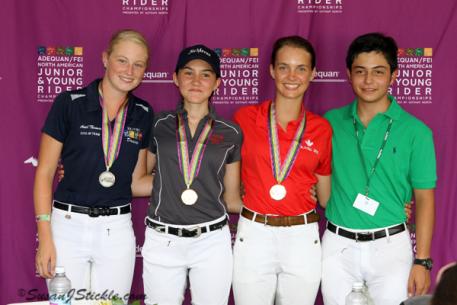 Junior Individual Dressage medalists from L to R: Ariel Thomas (Reg 7) - Silver, Ayden Uhlir (Reg 9) - Gold, Laurence Blais Tetreault (Quebec, CAN) - Bronze, and the high score dressage rider of the day, Nicolas Torres Rodriguez representing Columbia. (Photo: Susan J. Stickle)