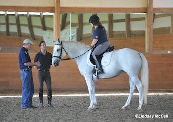 Kai Handt (Left) works with Ellie Brimmer and Captiva. Gil Merrick (right). Photo (c) Lindsay McCall