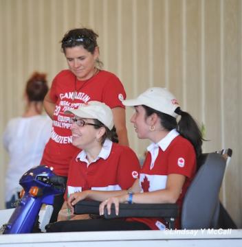 Jody Schloss (CAN) left and Robyn Andrews (CAN) right relaxing after the FEI Jog