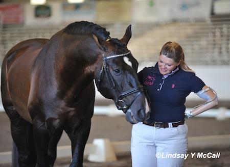 Susan Treabess of Winters, Calif. and horse Kamiakin smile together as they prepare for the FEI Para-Equestrian Dressage Jog for the CPEDI3* at Golden State Dressage