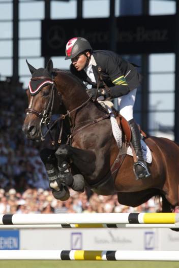 Riding as an individual, Canada's Eric Lamaze won the Rolex Grand Prix of Aachen in 2010 riding Hickstead."  Photo Credit - Frank Papelard, R&B Presse
