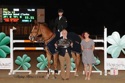 Winner’s awards, including a Horze Equestrian cooler, are presented to Ashlee Bond Clarke and Chela LS after they won the ,500 HITS Desert Classic, presented by Zoetis, at HITS Thermal. ©Flying Horse Photography
