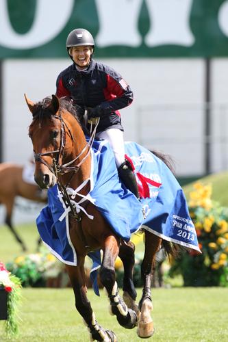 Ashlee Bond was beaming in her victory gallop with Agrostar after Saturday’s ,000 ASHCOR Technologies Cup. Photo © Spruce Meadows Media Services.