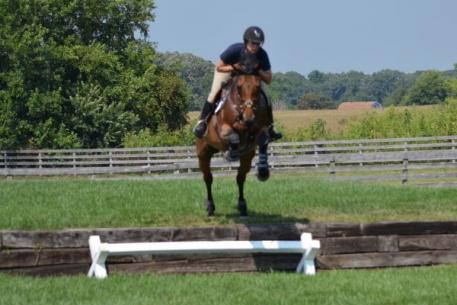 Riders navigate the bank exercise.