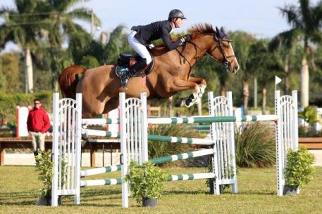 Ben Maher and Diva racing over the final oxer to take the win.