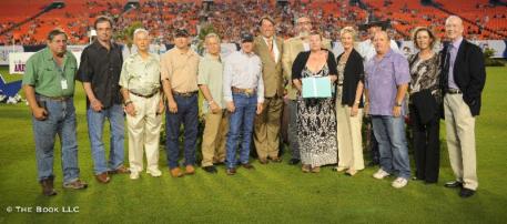 Members of the Brady family and a group of farriers accepted Seamus Brady's award on his behalf (photo © The Book LLC)