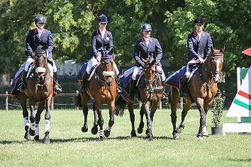 The winning British team at Montelibretti (ITA), left to right: Nicky Roncoroni, Dani Evans, Emilie Chandler and Paul Sims. (Photo: Massimo Argenziano/FEI). Free images for editorial purposes available at www.feiphotos.org.