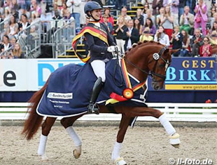 Beatrice Buchwald and Lord Carnaby win the 6-year-old division at the 2013 Bundeschampionate (Photo: Photo © LL-foto)