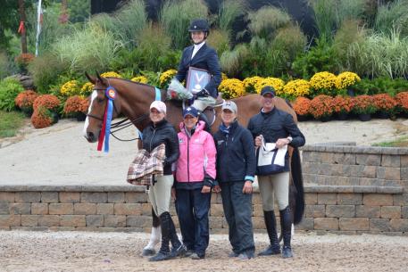 Winner of the IHJA Medal Finals, Caitlin Boyle, aboard Loredo and with trainers Jodi Vazquez, Kim Gardiner, Katie Kappler and Freddie Vazquez. Photo by Brenda Mueller.