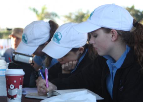 Diligently taking notes  in a lecture session from right Jessica Hainsowrth, 15, NY, Ayden Uhlir, 16, TX  and Emilly Gillispie, 16, OH (Photo courtesy of Ayden Uhlir)
