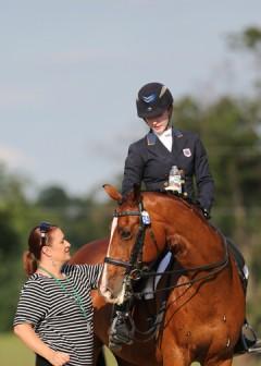 Catherine's mom Annie with Verdicci aftet winning Individual Young Rider Dressage Gold