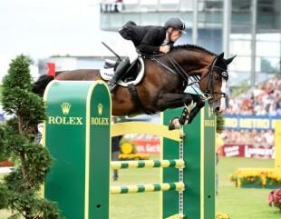 Third place Marcus Ehning riding Plot Blue &copy; Rolex/Kit Houghton