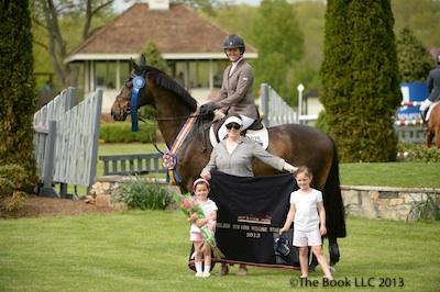 Christine McCrea and Romantovich Take One in their winning presentation with Emma, Barbara, and Lily Hakim
