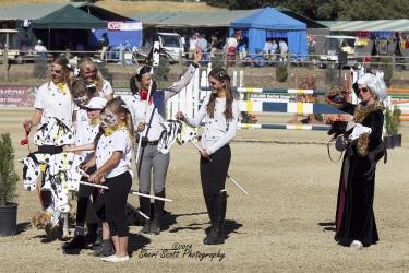 Cruella De Vil and her pack of dalmations invade the Grand Prix Arena Photo: Sheri Scott